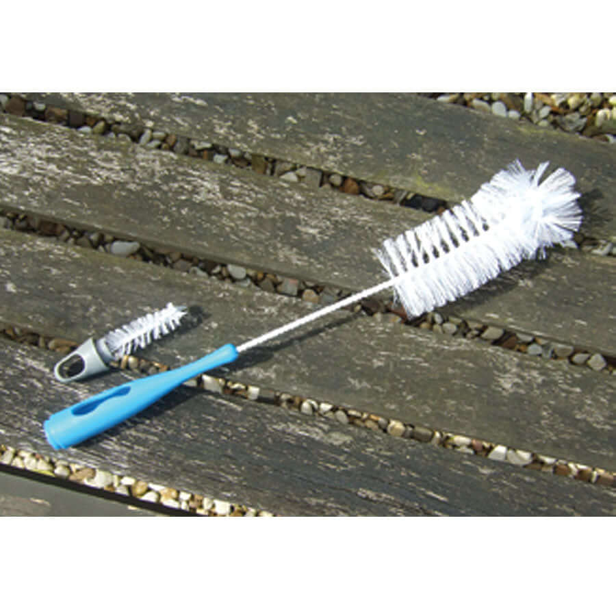 Thin cleaning brush with white bristles and a blue handle, perfect for cleaning bird feeders.